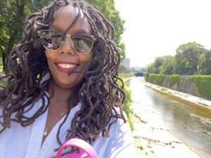 Saba Mwine, managing director of the Homelessness Policy Research Institute at the USC Price School, was introduced to a like-minded Trojan during a recent trip to Vienna.