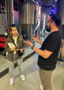Mariela Gomez reports on the craft beer industry at Farland Aleworks in Tijuana. Photo courtesy of Amara Aguilar