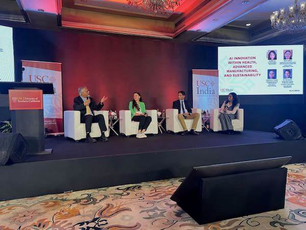 Sk Gupta, Bistra Dilkina and Shri Narayanan speak with Bloomberg reporter Saritha Rai on a panel on AI in Bengaluru.