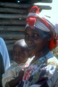 A mother and child attend nutrition support services in Makueni, Kenya