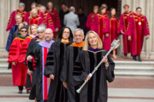 Deans of USC’s nearly two dozen schools enter Alumni Memorial Park as the inauguration processional begins