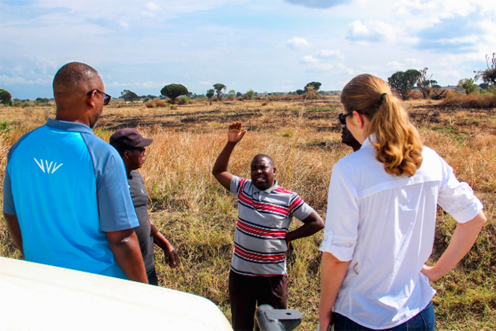 Dr. Laura Ferguson with Government of Uganda officials visiting sites of human-wildlife conflict in Queen Elizabeth Conservation Area, Uganda